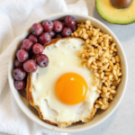 Delicious healthy breakfast bowl with fresh fruits, nuts, and yogurt for a balanced start to the day.