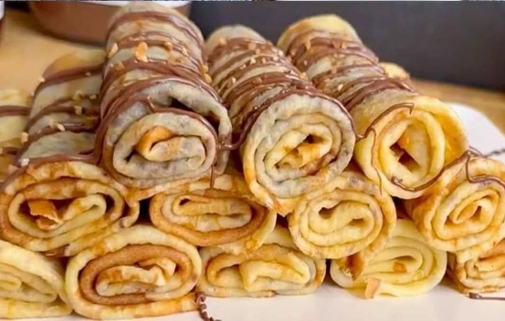 stack of fluffy pancakes topped with syrup and butter the best homemade pancakes recipe