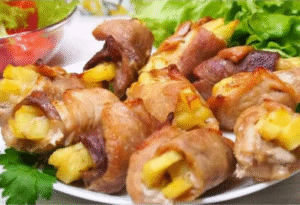 Crispy pork and potato rolls baked golden, served on a white plate