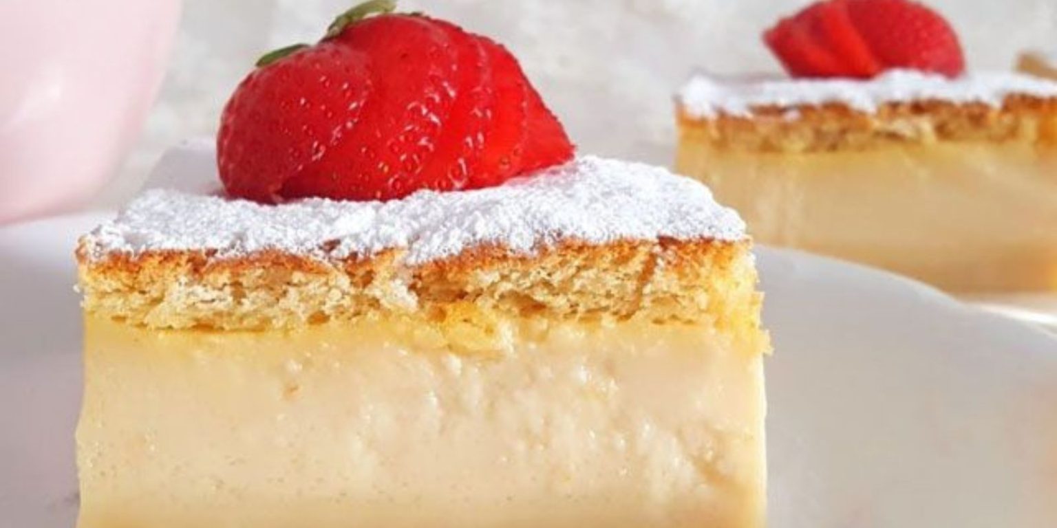 White chocolate magic cake recipe topped with strawberries