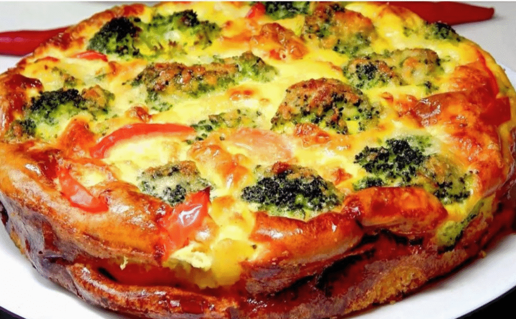 Golden baked vegetable flan with melted cheese on top, served warm for a healthy dinner