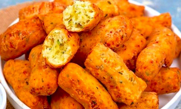 Golden fried bread bites recipe served warm, crispy outside and soft inside with melted cheese and parsley.