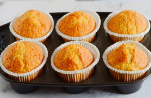 cream muffins recipe final result: soft golden muffins on cooling rack