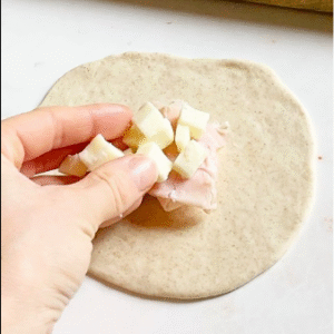Adding ham and cheese filling to quick pan-fried focaccia dough