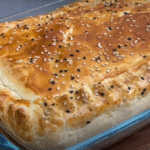 golden shallot egg tart recipe with sesame seeds on top