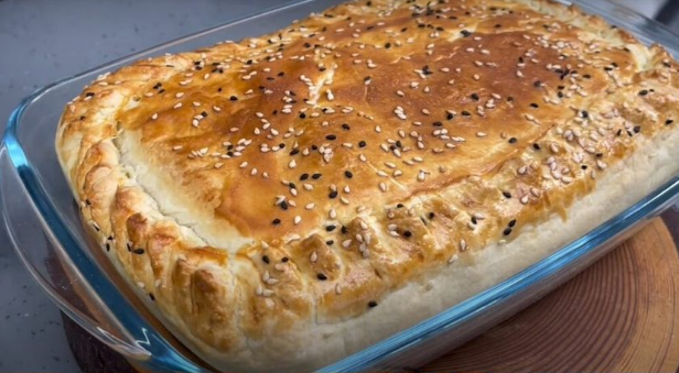 golden shallot egg tart recipe with sesame seeds on top