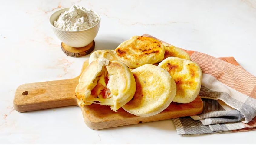 Golden quick pan-fried focaccia stuffed with ham and cheese