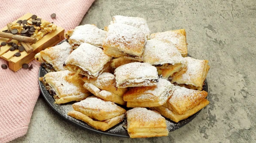 Plate of apple and chocolate puff pastry desserts
