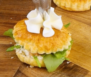 puff pastry appetizers with cream cheese and arugula