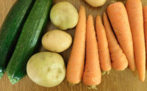 Fresh vegetables prepared for vegetable soup with parmesan croutons