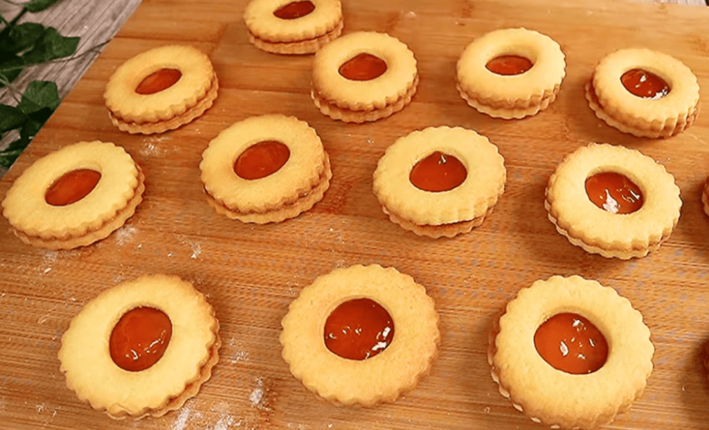 Homemade shortbread cookies served on wooden board