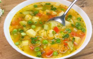 Bowl of vegetable soup with parmesan croutons