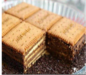 Layered no bake biscuit cake recipe with chocolate cream and biscuit topping.