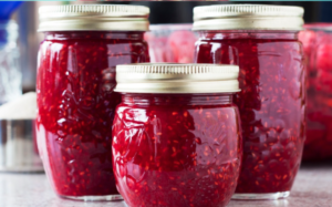 homemade pomegranate jam in glass jars