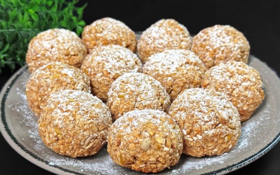 baked oatmeal with nuts and fruit served as healthy breakfast bars