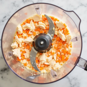 blending chicken carrot spread in food processor