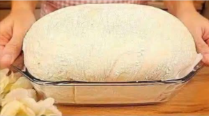 Shaping dough for classic homemade bread before final rise