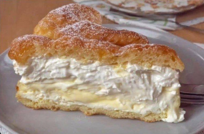 Slice of Italian cream stuffed brioche showing layers