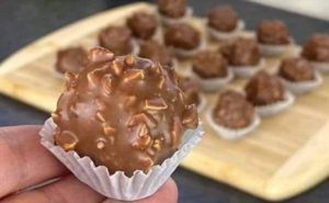 Close up of chocolate coated date truffle