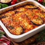 Baked eggplant parmesan with melted mozzarella and golden parmesan cheese