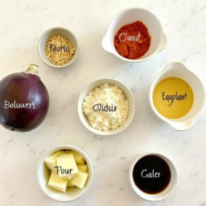 Ingredients for baked eggplant parmesan including eggplant, mozzarella, and tomato sauce