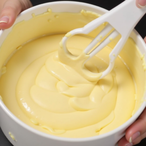mixing cream cheese filling for quick bundt cake recipe