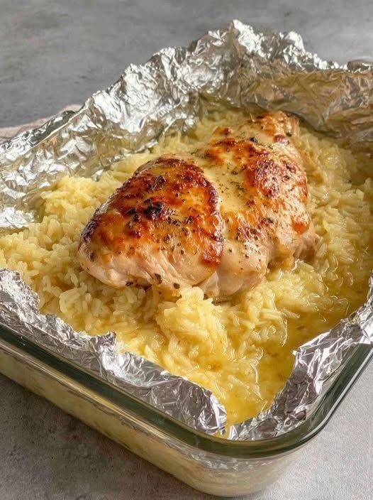 Oven Baked Chicken and Rice with golden seasoned chicken breasts