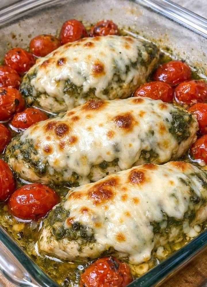 Spinach Pesto Mozzarella Chicken Bake with melted mozzarella cheese and roasted cherry tomatoes
