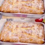 simple old-fashioned cake with powdered sugar and sweet glaze baked in a rectangular dish