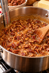 Pecan Dandy Dos caramel mixture cooking with pecans and butter