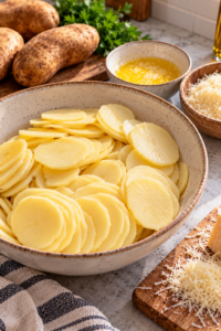 Thin potato slices prepared for an Oven Baked 3-Ingredients Potato Ring