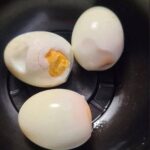 spoiled egg and hard boiled eggs showing signs of spoilage