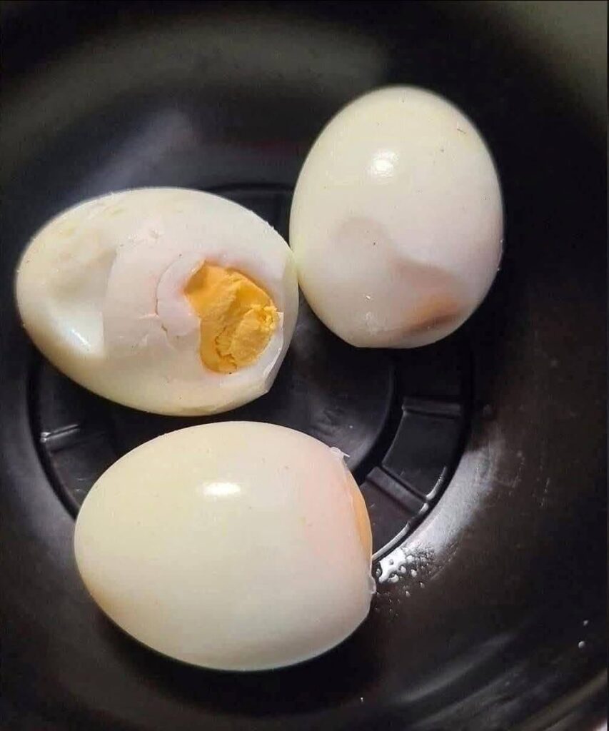 spoiled egg and hard boiled eggs showing signs of spoilage