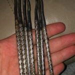 Vintage kitchen tools with ornate metal handles