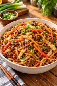 Ground Beef Lo Mein served with glossy noodles and vegetables