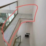 Unused space beside a staircase with potential for storage and home design