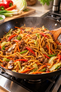 Ground Beef Lo Mein noodles cooking with beef and vegetables