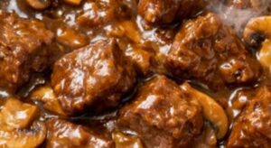 Slow Cooker 4-Ingredient Mushroom Beef Tips with tender beef, mushrooms, and rich brown gravy.